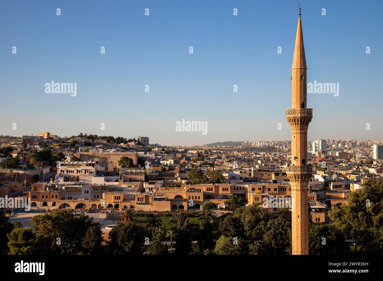 Sanliurfa,Turkey - 09-15-2023:View of the mosque minaret with the old city of Sanliurfa Stock Photo