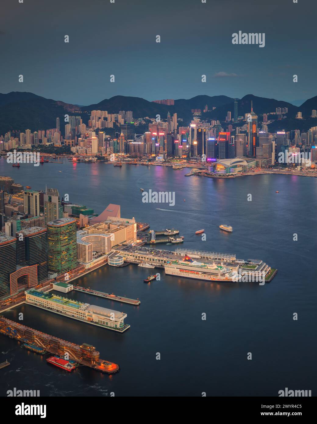 Illuminated Hong King Skyline by Kowloon Bay at night Stock Photo - Alamy