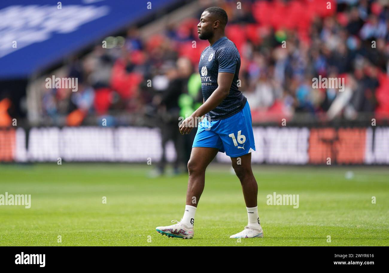 LONDON, ENGLAND - APRIL 7: David Ajiboye of Peterborough United warming up prior to the Bristol Street Motors Trophy Final between Peterborough United and Wycombe Wanderers at Wembley Stadium on April 7, 2024 in London, England. (Photo by Dylan Hepworth/MB Media) Stock Photo