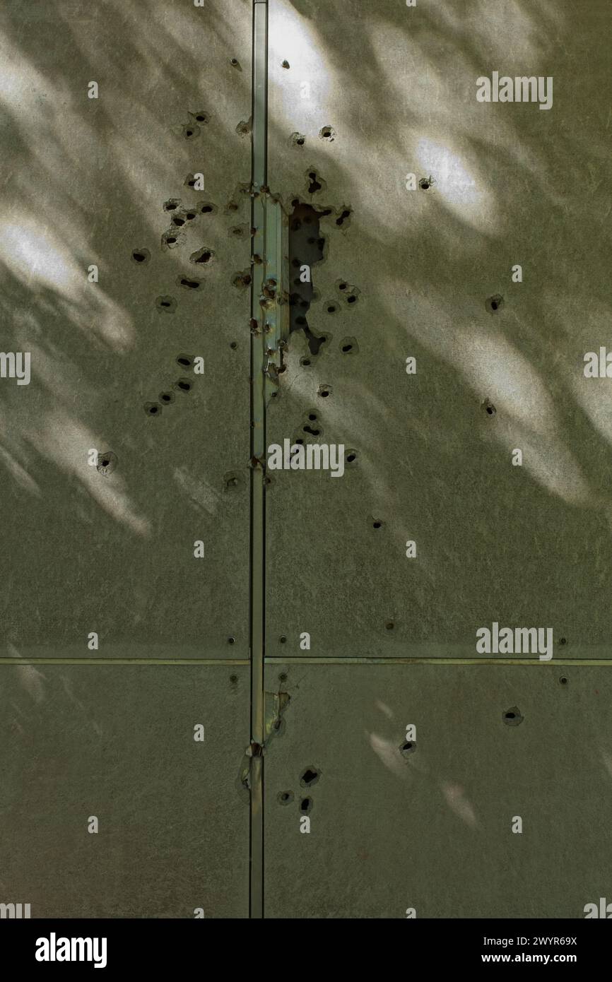 Aged wall riddled with bullet holes Stock Photo - Alamy