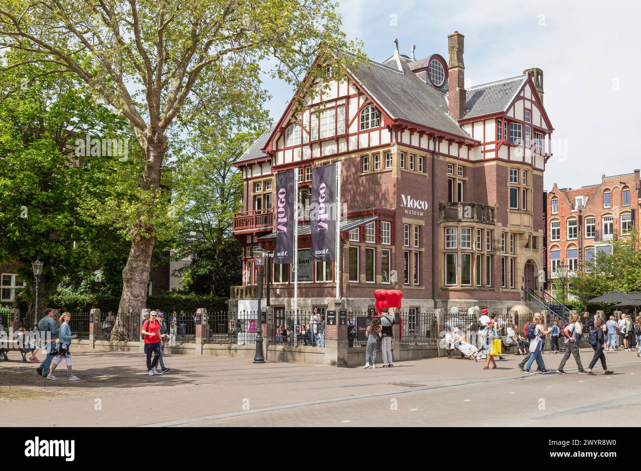 Visitors of the Moco art museum in Amsterdam at a display of an NFT by  anonymous collector 33NFT Stock Photo - Alamy
