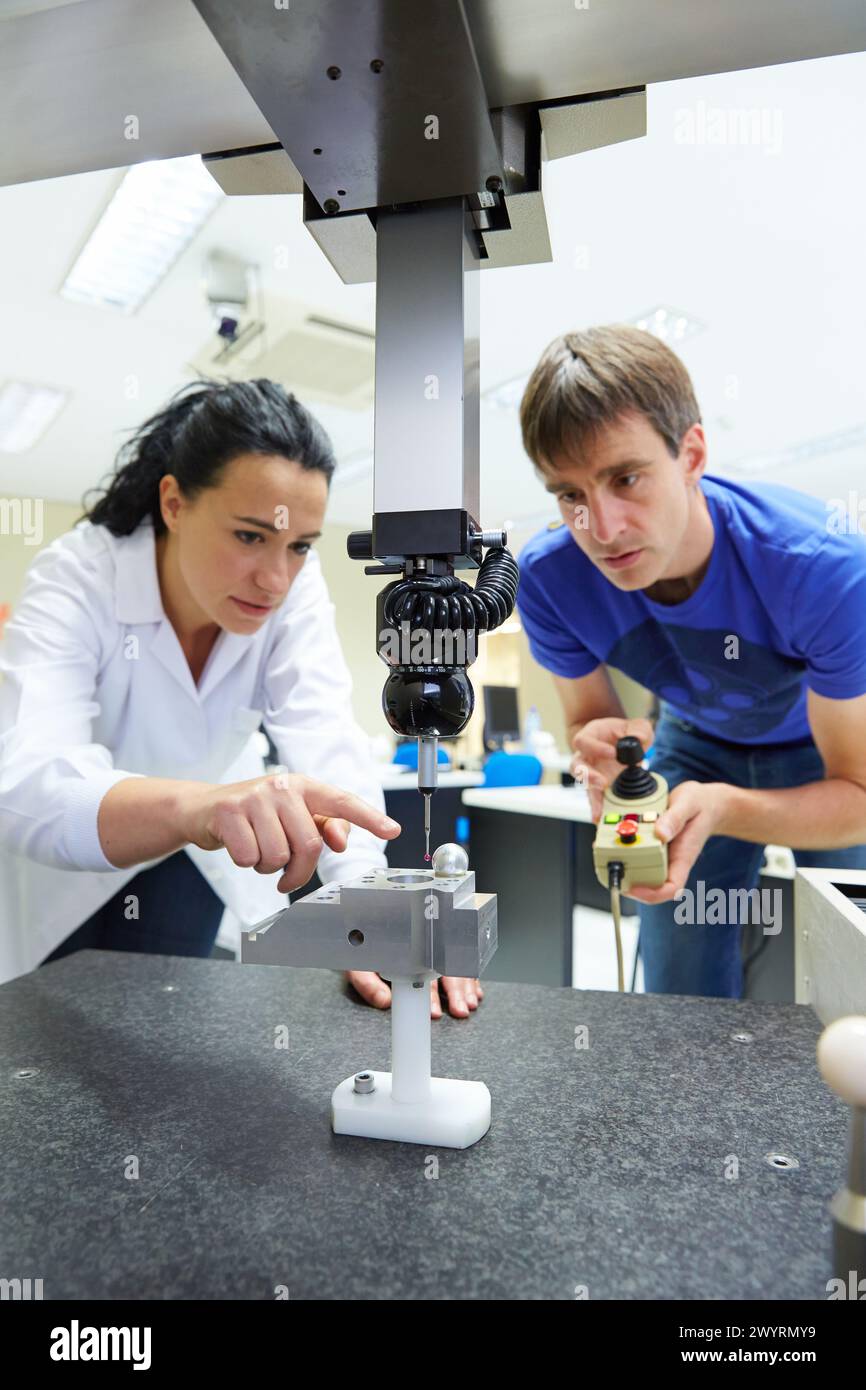 Training room. Student learning measured in three-dimensional machine. Coordinate Measuring Machine. Innovative Metrology applied. Sariki Metrology. Elgoibar. Gipuzkoa. Basque Country. Spain. Stock Photo