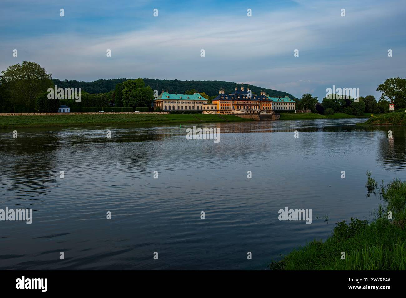 Pillnitz Palace in the evening sun, seen from the opposite banks of the Elbe river in Kleinzschachwitz, Dresden, Saxony, Germany. Stock Photo