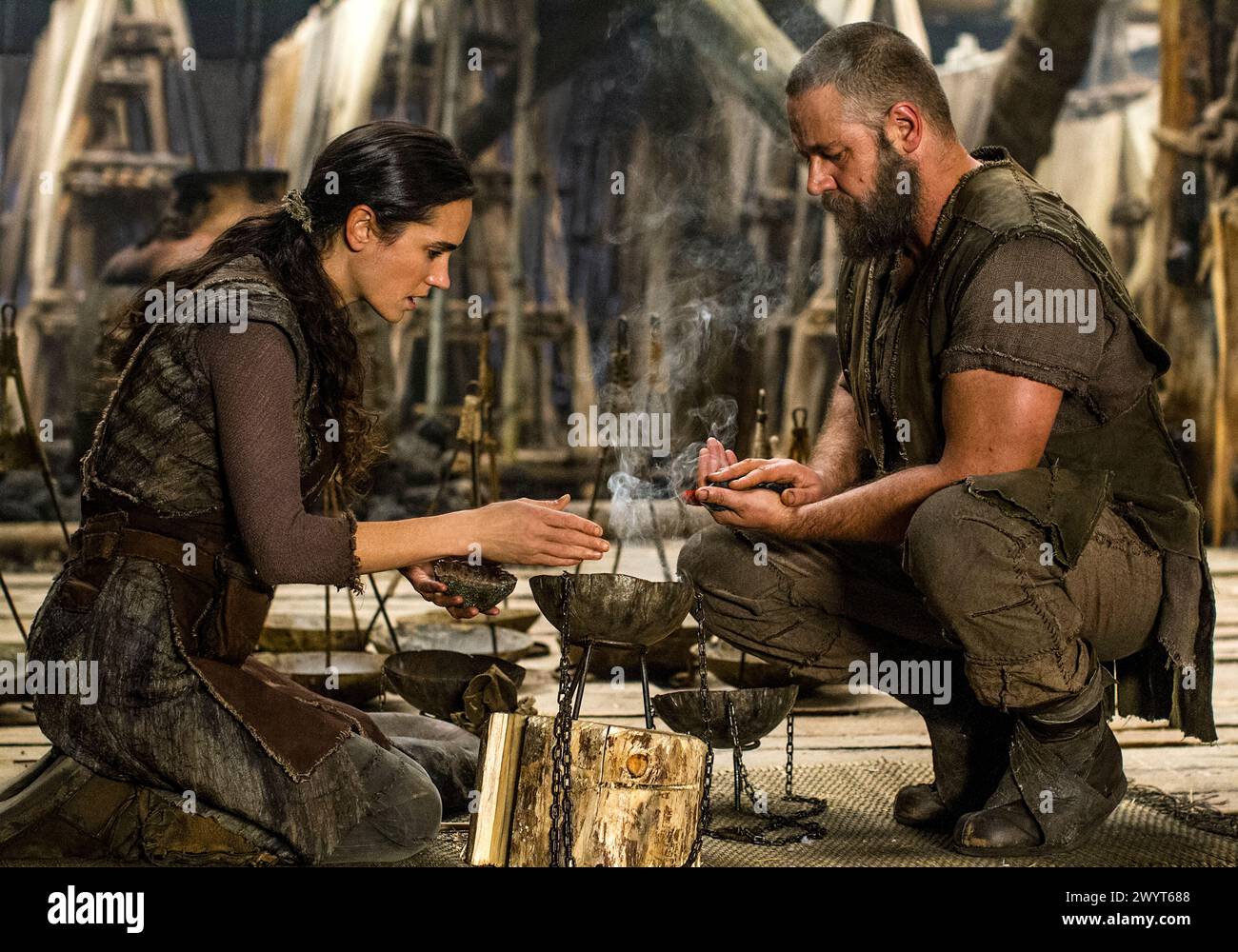 Noah (2014) directed by Darren Aronofsky and starring  Jennifer Connelly as Naameh and Russell Crowe as Noah. Noah is chosen by God to undertake a momentous mission before an apocalyptic flood cleanses the world. Publicity photograph.***EDITORIAL USE ONLY*** Credit: BFA / Niko Tavernise / Paramount Pictures Stock Photo