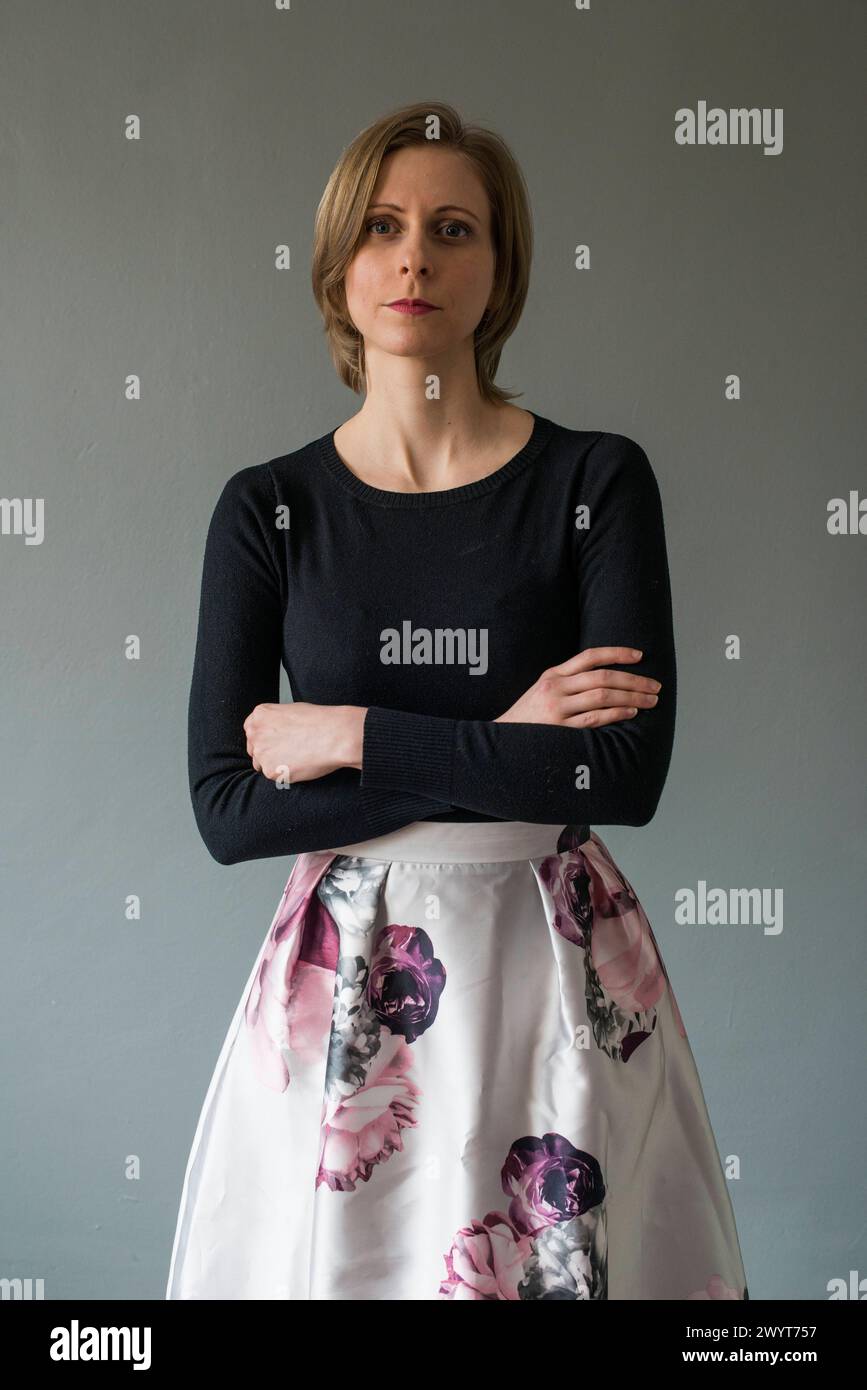 Portrait woman Studio portrait of a young adult caucasian woman wearing a colorfull skirt. Tilburg, Netherlands. MRYES Tilburg Studio Tuinstraat Noord-Brabant Nederland Copyright: xGuidoxKoppesx Stock Photo