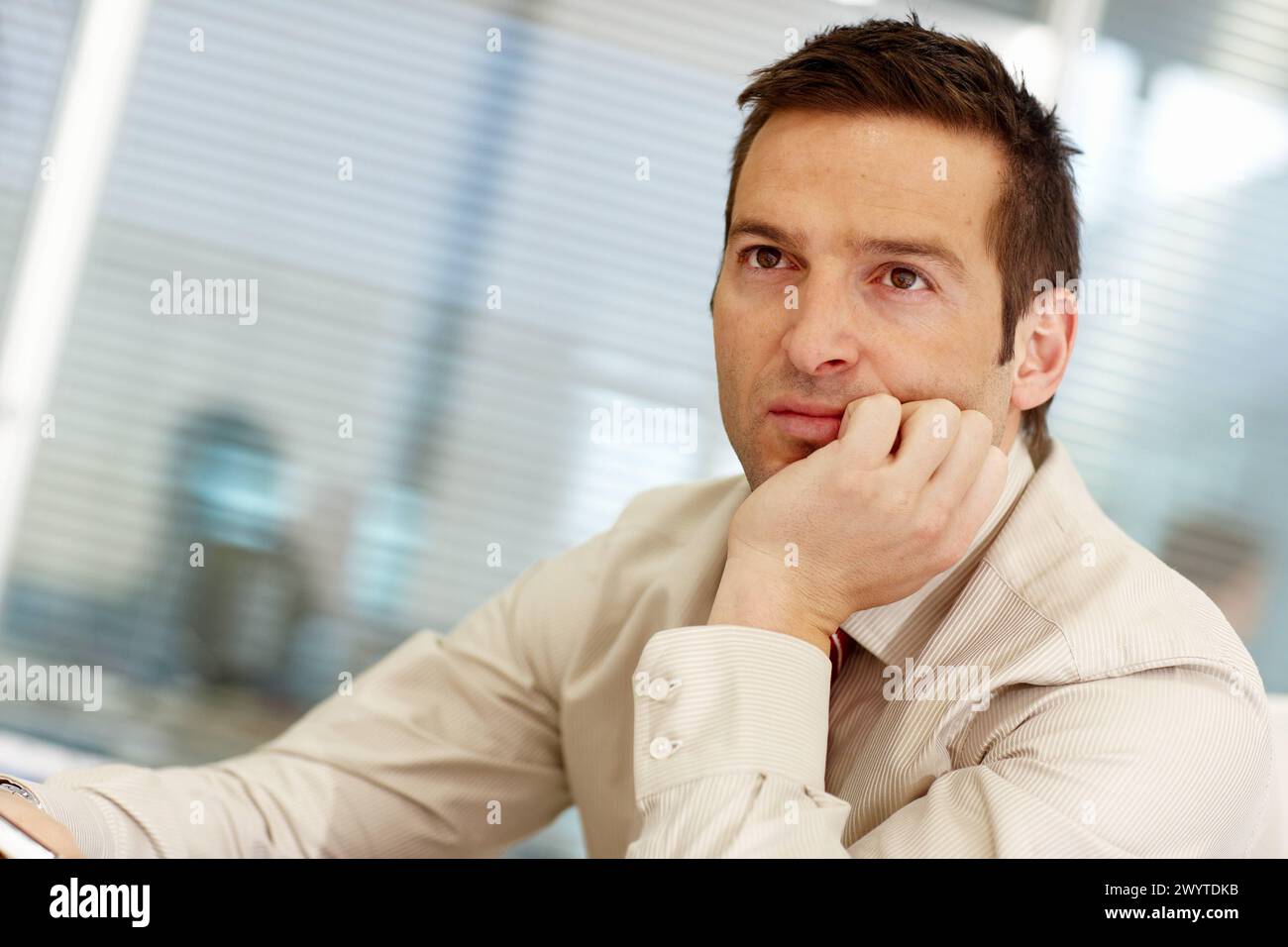 Touching ones chin hi-res stock photography and images - Alamy