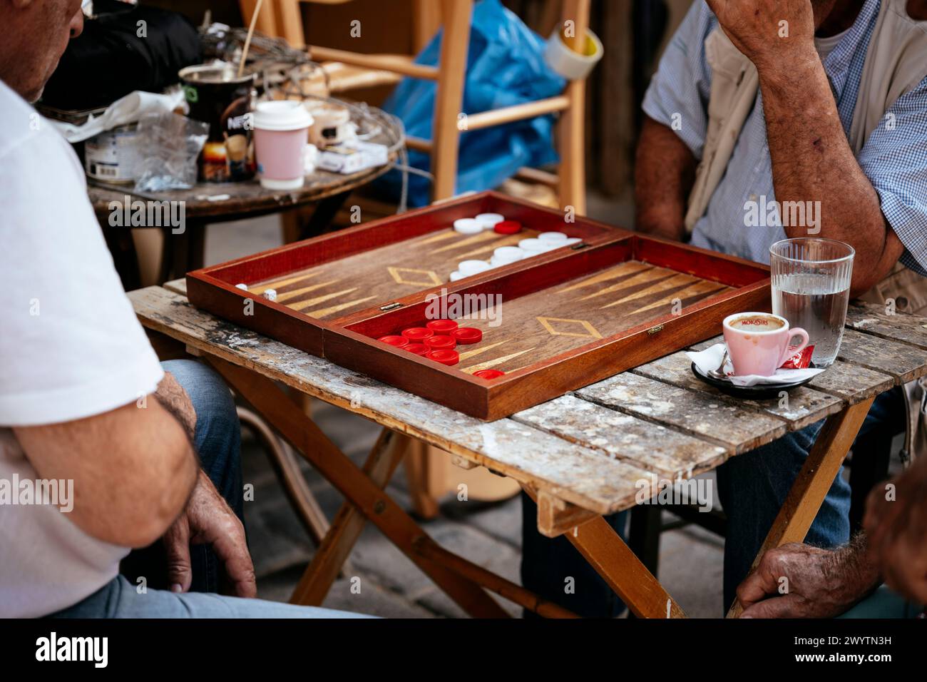 Men playing Backgammon, Athens, Attica, Greece Stock Photo