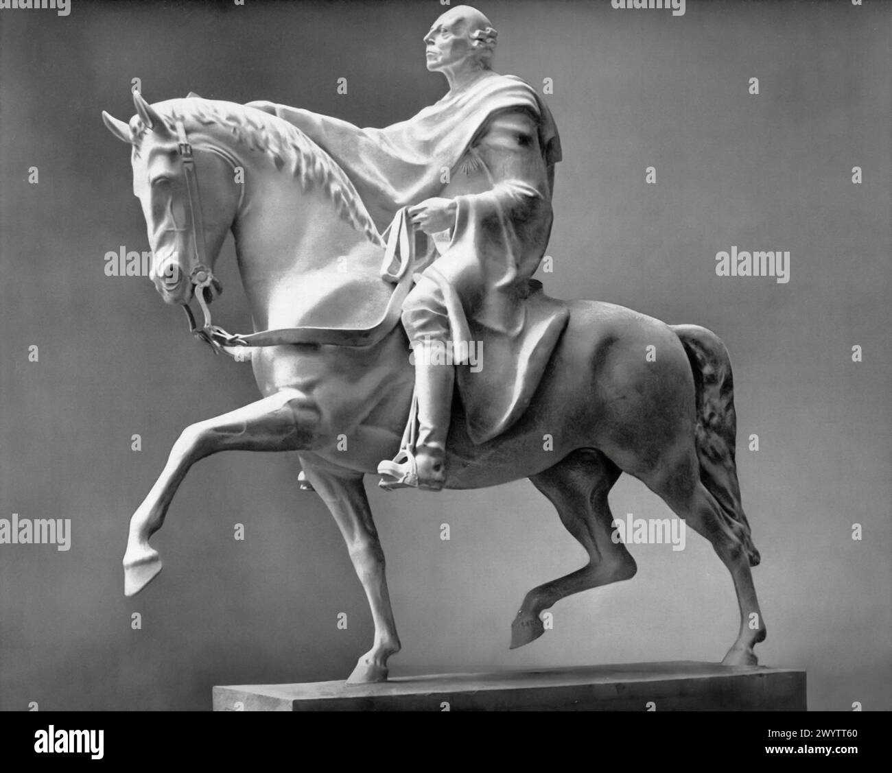 The Royal Rider' a sculpture by Josef Thorak, dated circa 1943, serves as a example of World War II propaganda, reflecting Nazi ideology with its themes of strength and tradition. The piece features a figure on horseback, resembling Thorak himself. Stock Photo