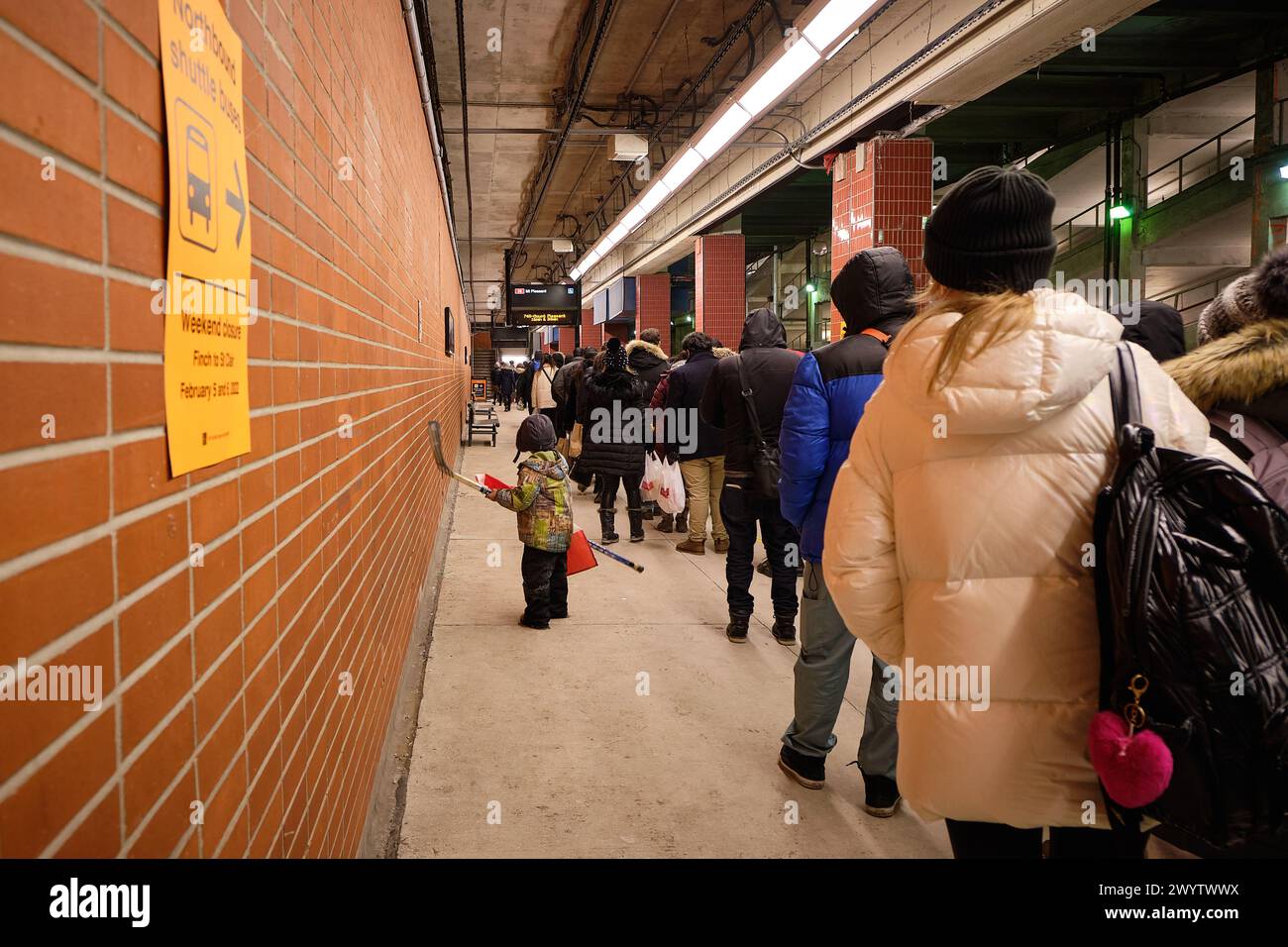 People waiting for a shuttle bus due to line closure on a TTC Subway ...