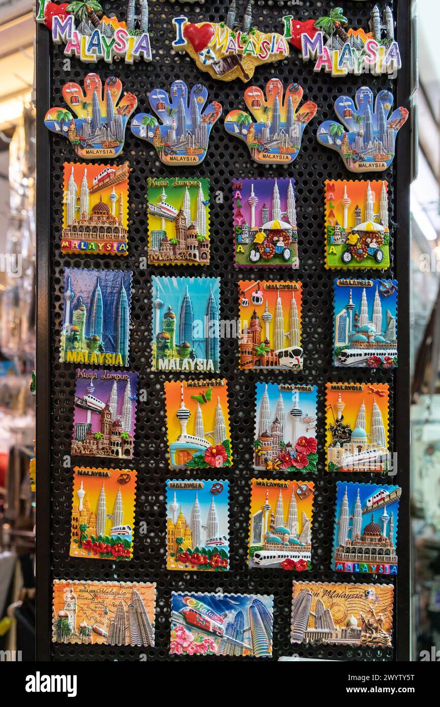 Kuala Lumpur, Malaysia - April 6,2024 : Close-up view of the various types of Malaysia's fridge magnet souvenirs for sale in the souvenir shop. Stock Photo