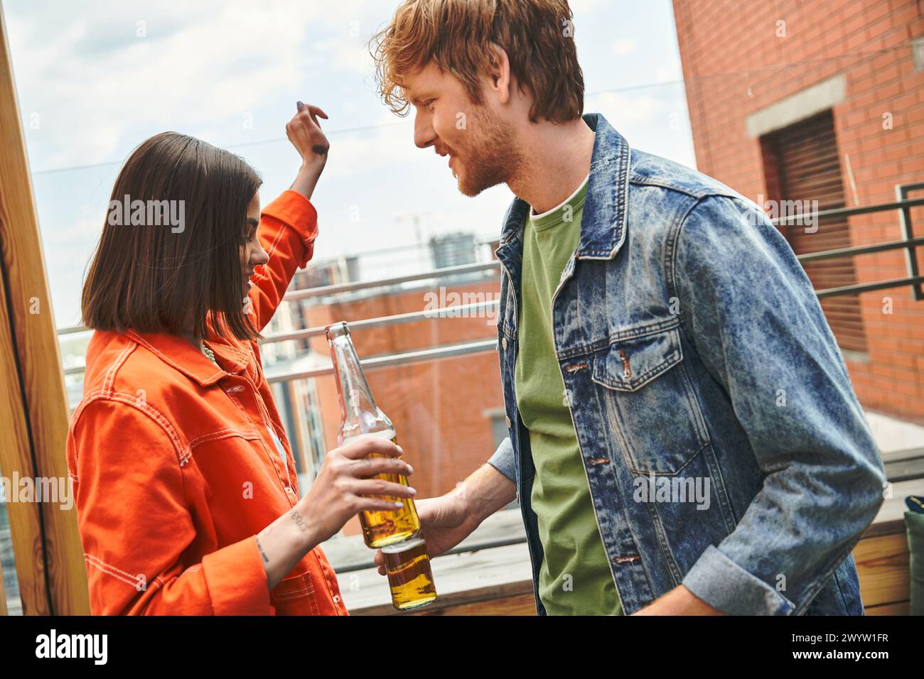 A man and a woman stand side by side, exuding a sense of unity and togetherness as they look ahead with a shared purpose Stock Photo