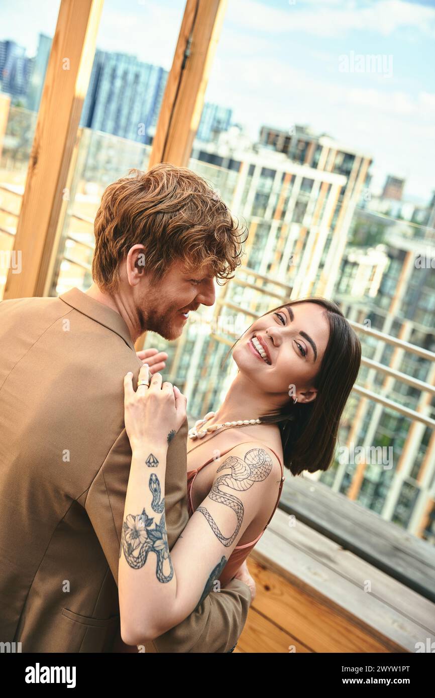 A man and woman stand side by side, their eyes locked in a moment of silent connection and understanding Stock Photo