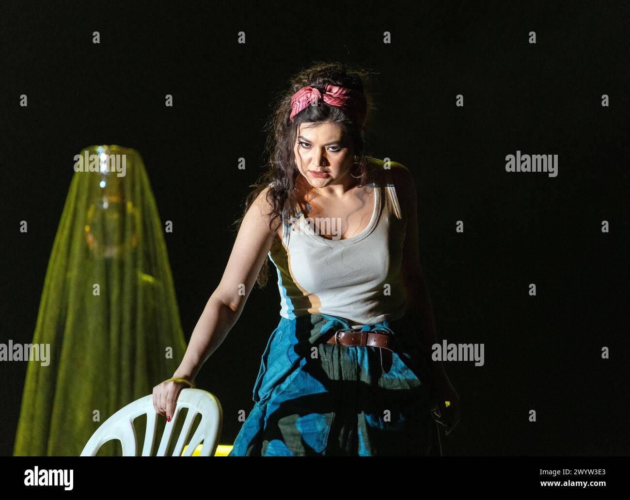 Aigul Akhmetshina (Carmen) in CARMEN at the Royal Opera House, Covent Garden, London WC2  05/04/2024 music: Georges Bizet  libretto: Henri Meilhac & Ludovic Halevy  dramaturg: Elisa Zaninotto  conductor: Antonello Manacorda  set design: Paulo Fantin  costumes: Carla Teti  lighting: Alessandro Carletti  director: Damiano Michieletto Stock Photo