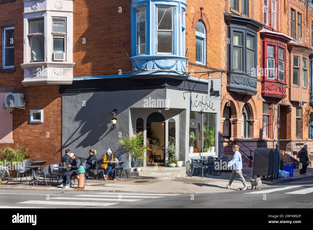 People outside a coffee shop in Fitlers Square neighborhood, Philadelphia, Pennsylvania, USA Stock Photo