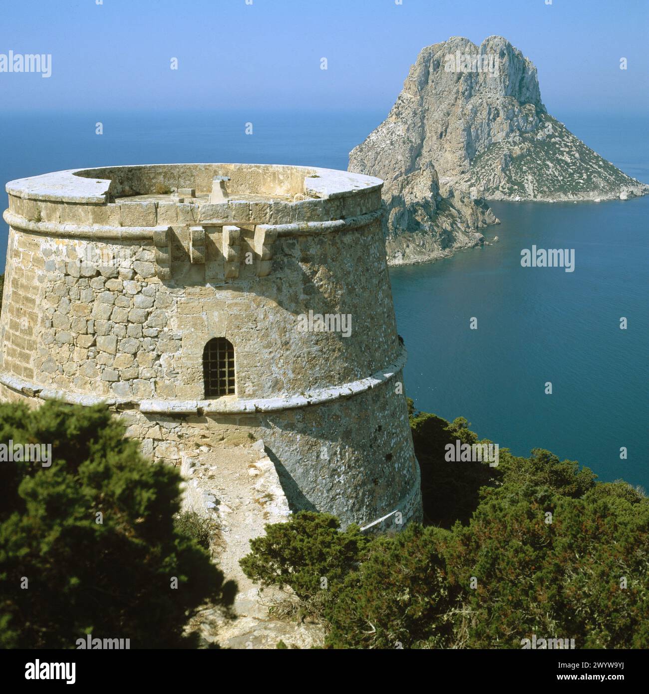 Torre des Savinar and Es Vedrà and Es Vedranell islands. Ibiza, Balearic Islands. Spain. Stock Photo