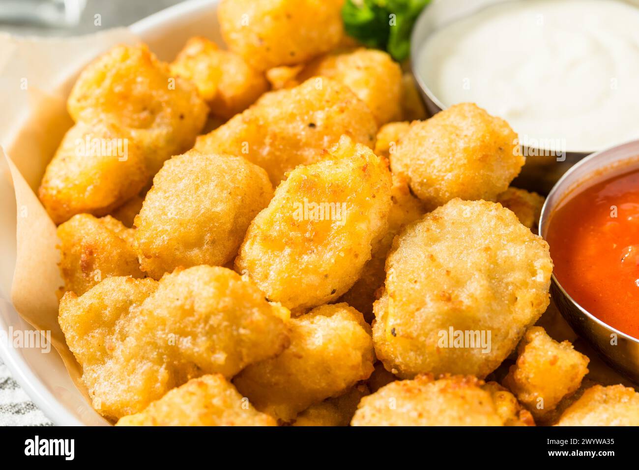 Homemade Deep Fried Wisconsin Cheese Curds with Dipping Sauce Stock