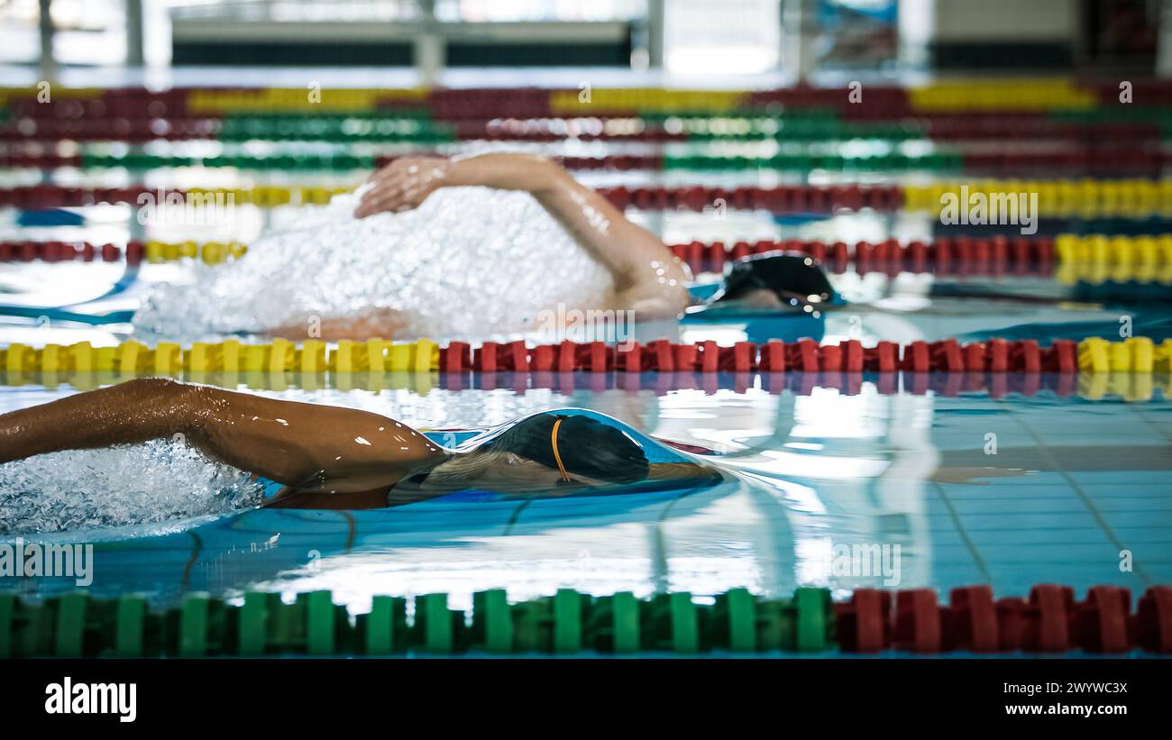 Two female swimmers during a race in the freestyle swim discipline ...