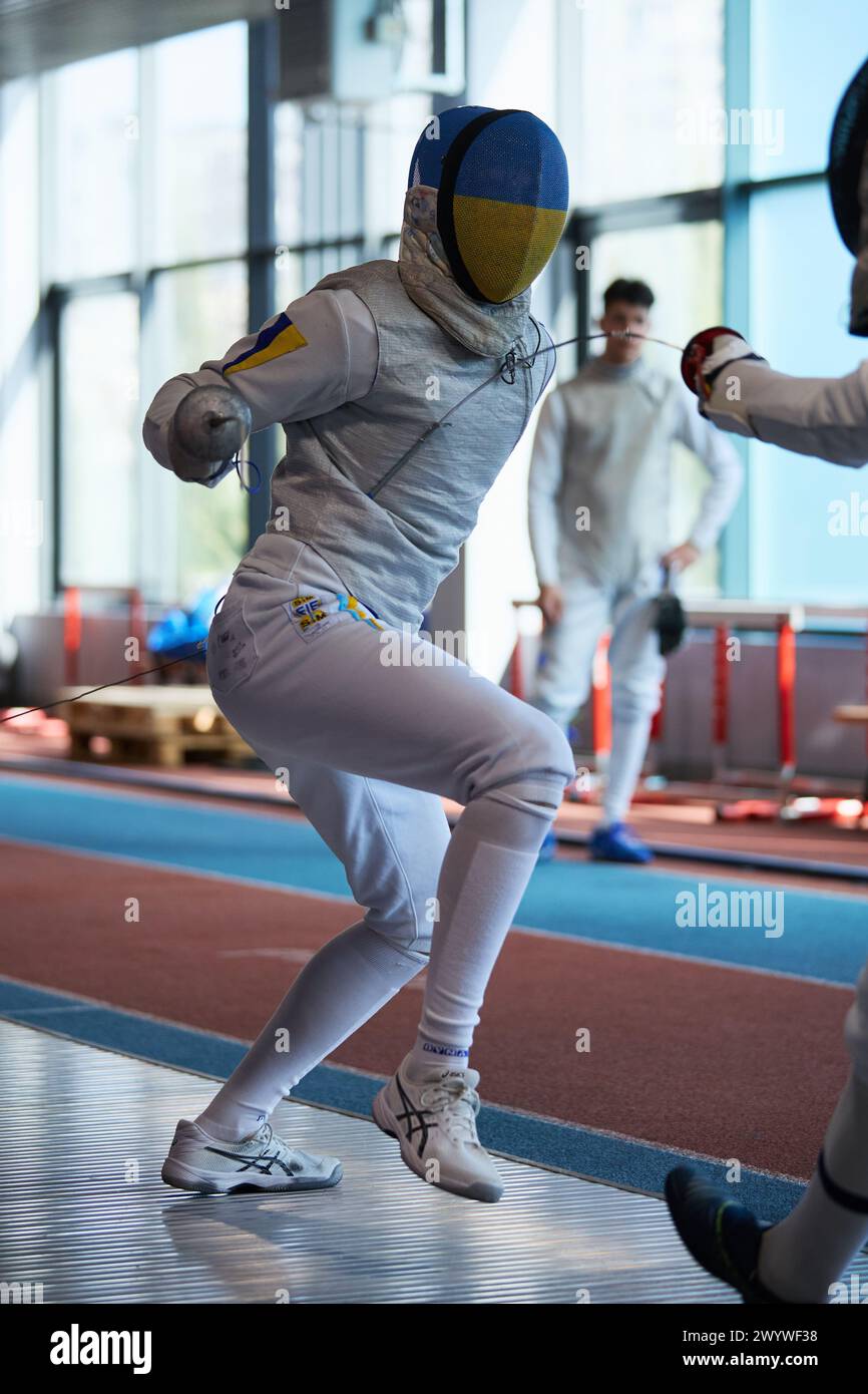 National Fencing Olympic Team member fighting at the Championship of