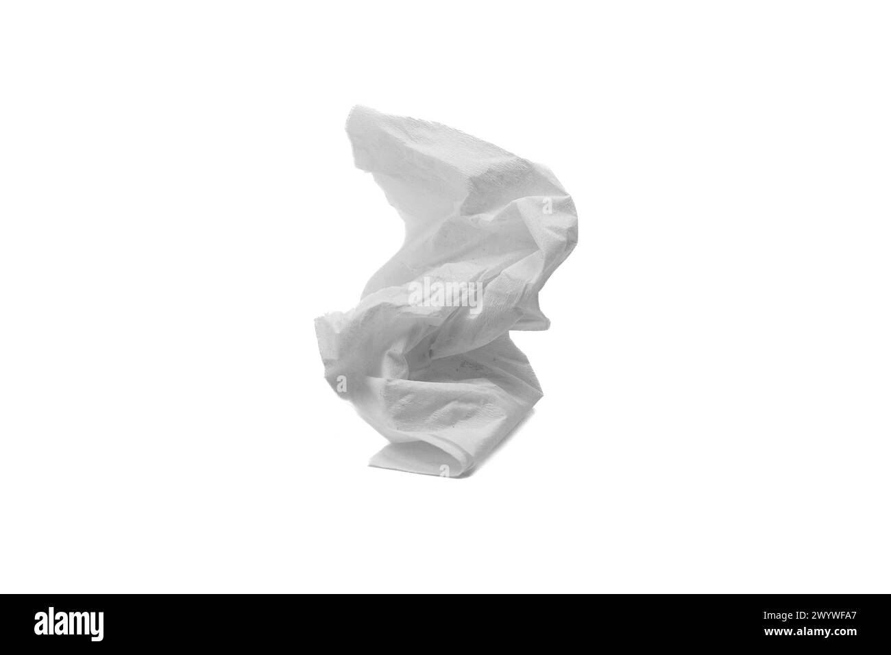 Crumpled tissue paper. Used screwed paper tissue isolated on white background. Personal hygiene Stock Photo