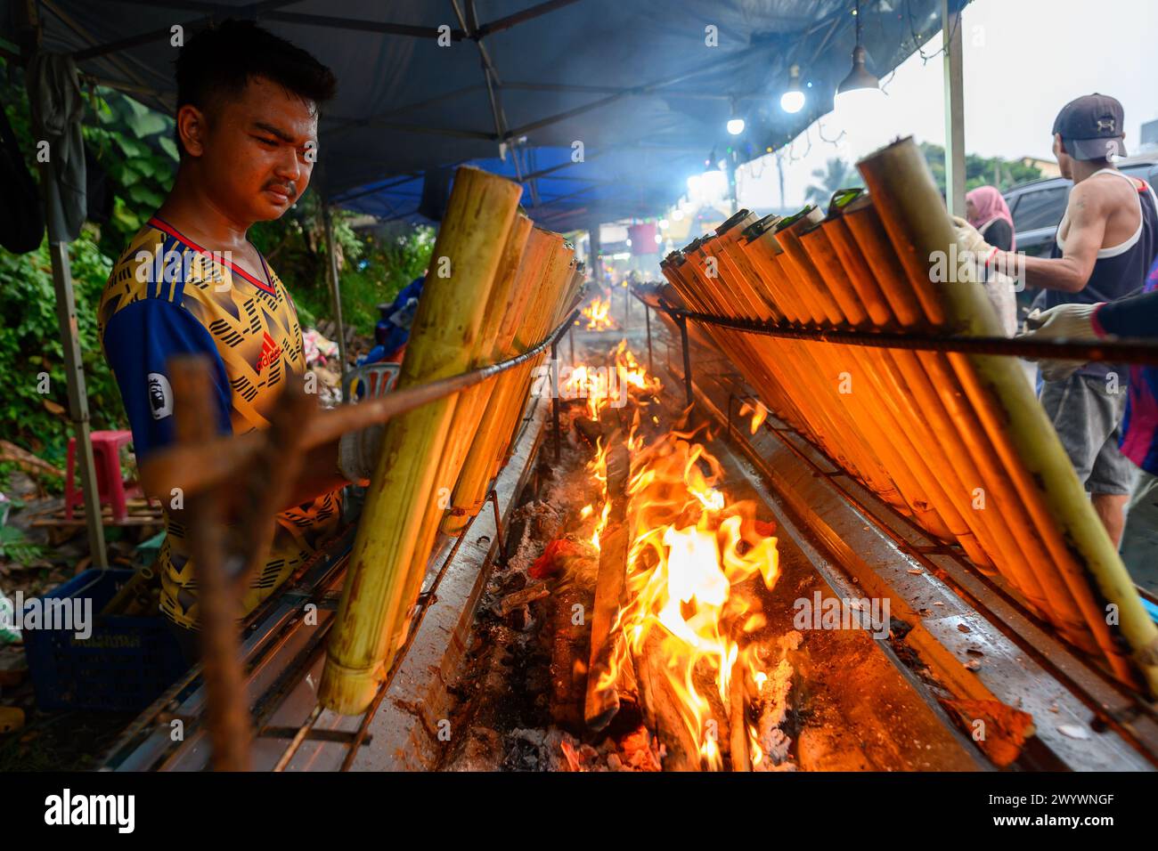Cooks Using Tubes Food bamboo tubes hi-res stock photography and images - Alamy
