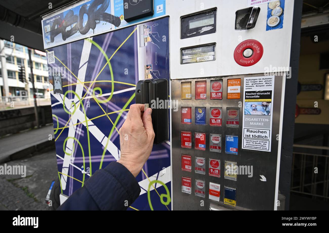 are cigarette machines illegal 08 April 2024, Baden-Württemberg, Stuttgart: A Tobaccoland cigarette  vending machine. According to its own information, the company operates  85,000 vending machines, making it the market leader in the sale of branded  cigarettes