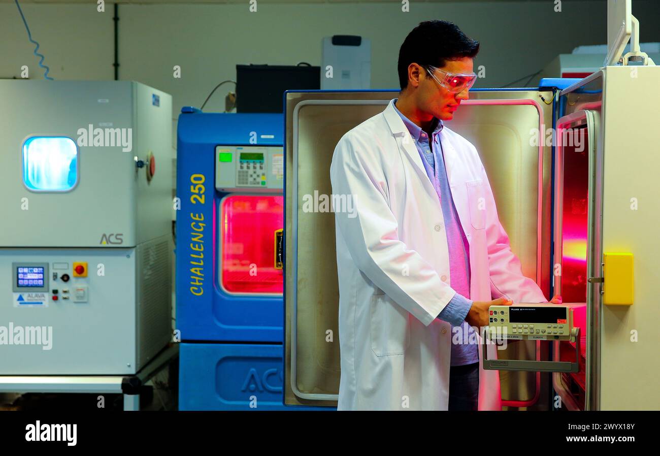 Researcher. Test climate at high and low temperatures. Climate Chamber ...