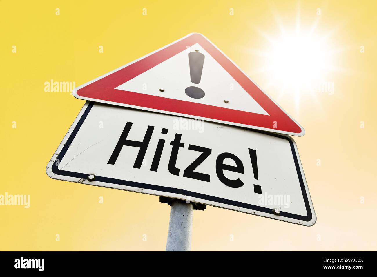 FOTOMONTAGE, Gefahrenschild Hitze *** FOTOMONTAGE, heat hazard sign Stock Photo