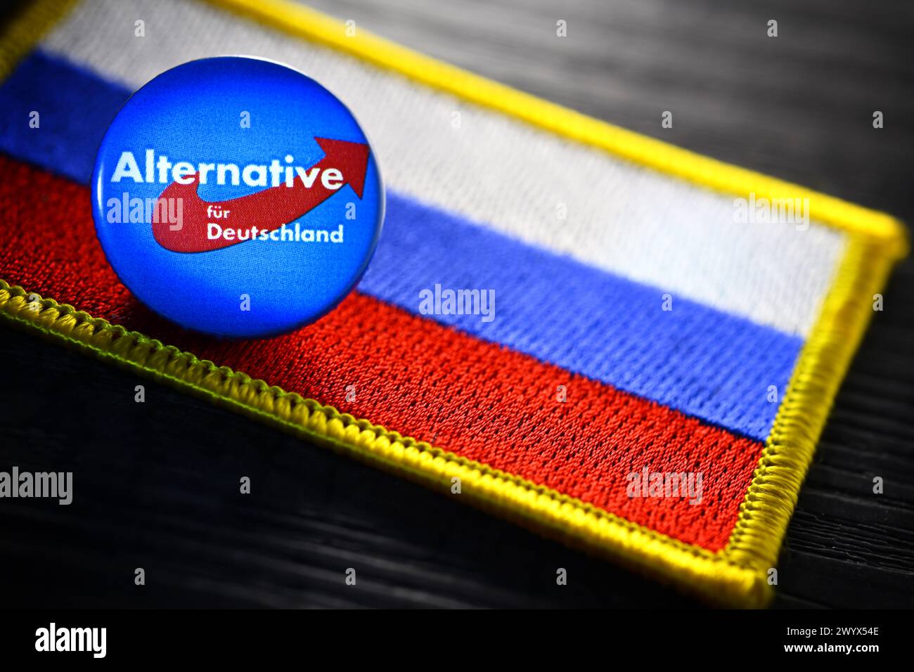 AfD Party Badge On A Flag Of Russia, Symbolic Photo For A Possible Proximity Of The AfD To Russia Stock Photo