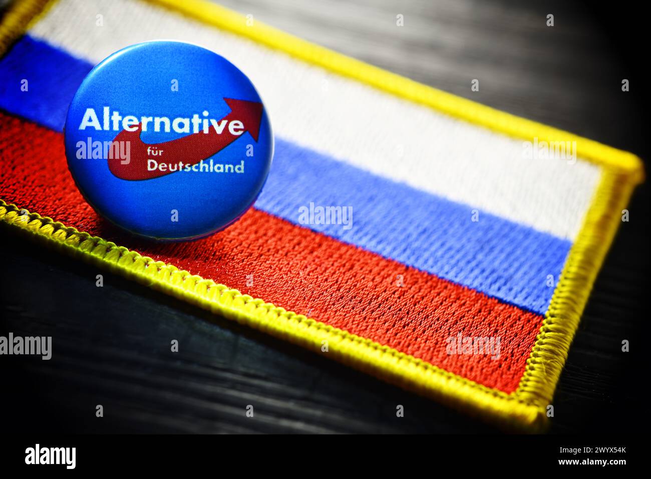 AfD Party Badge On A Flag Of Russia, Symbolic Photo For A Possible Proximity Of The AfD To Russia Stock Photo