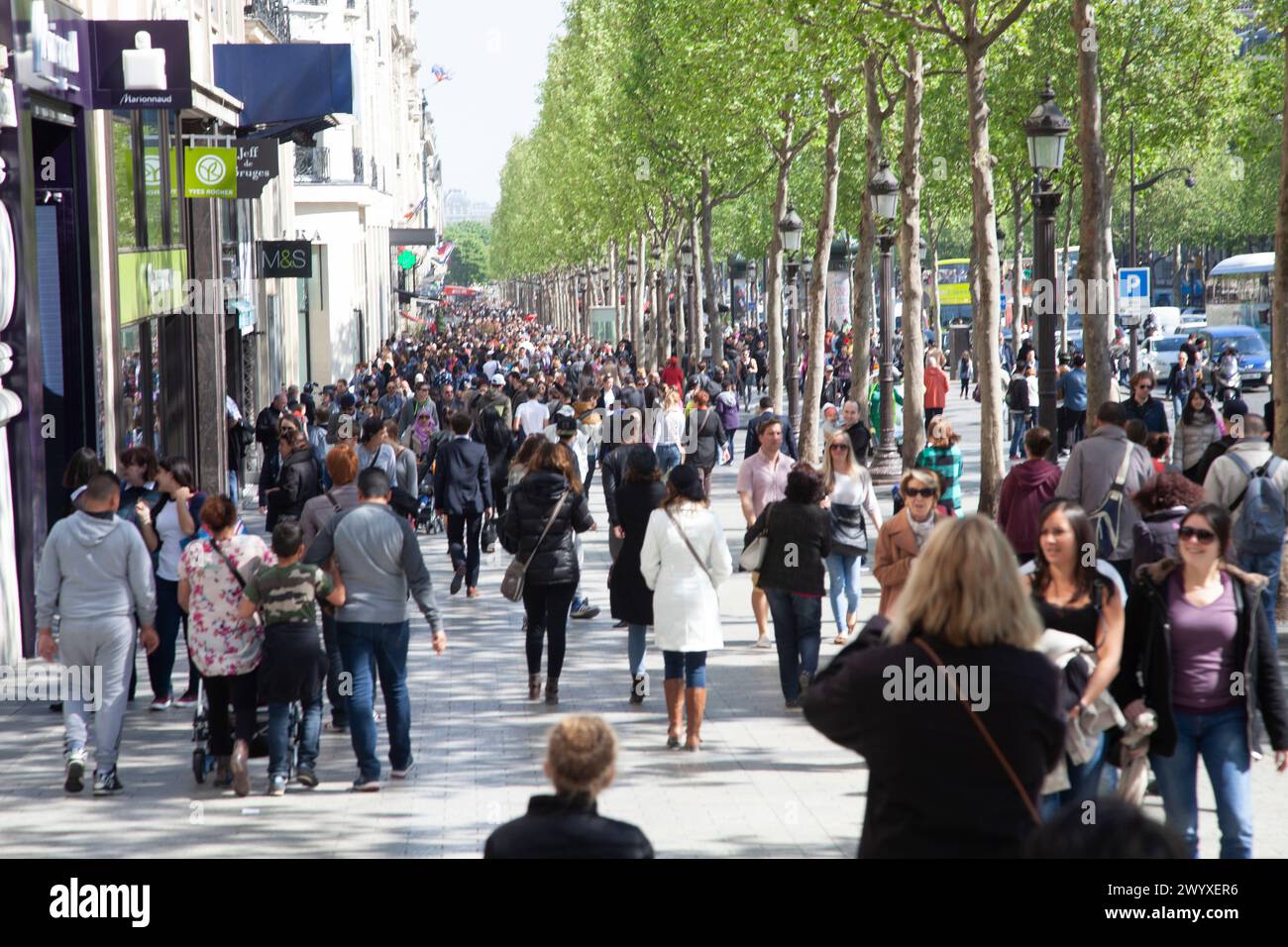 Paris France, people  on the champs Elysees in summer Stock Photo