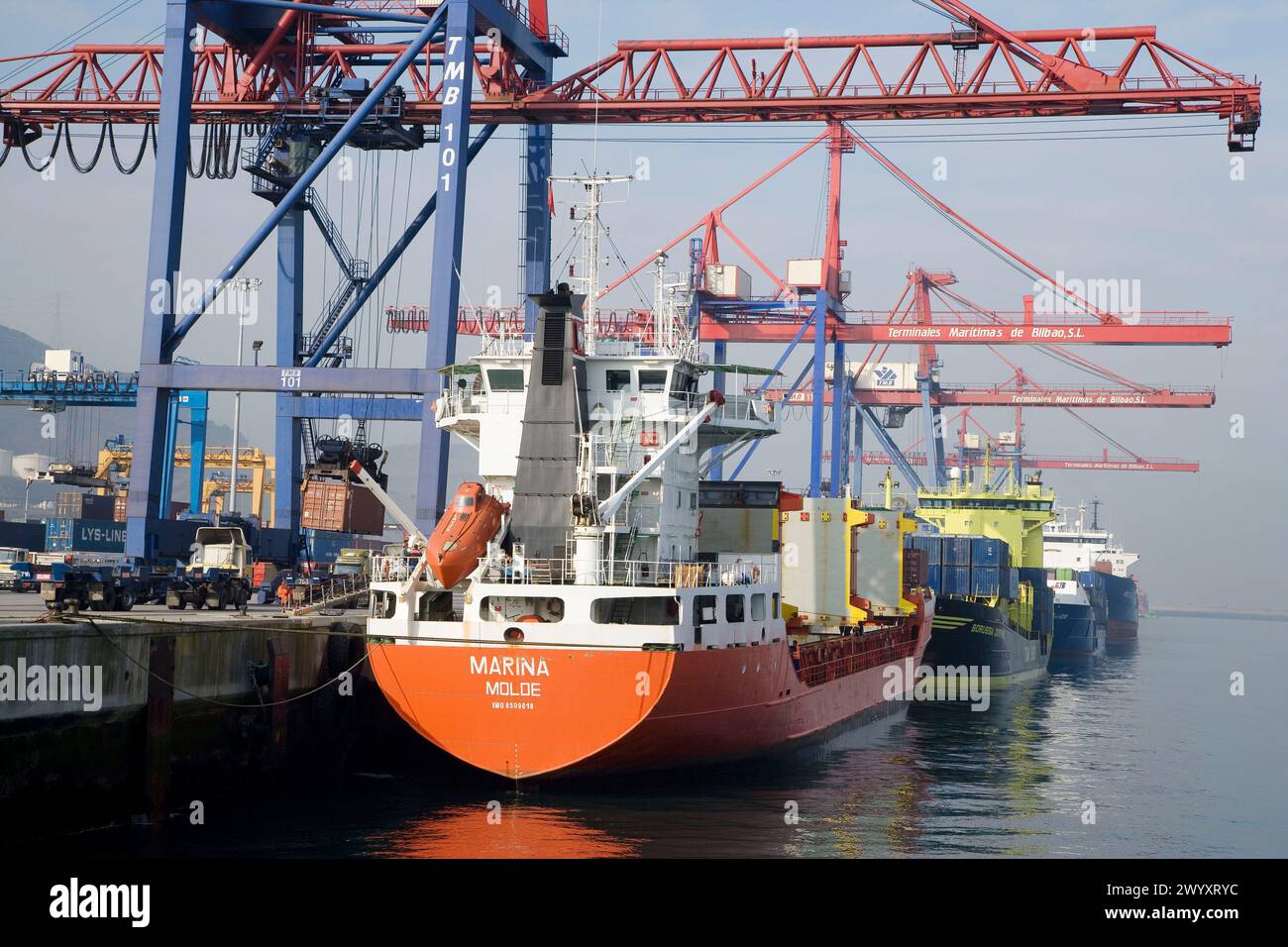 Loading cargo ships, Port of Bilbao, Santurtzi. Biscay, Euskadi, Spain. Stock Photo
