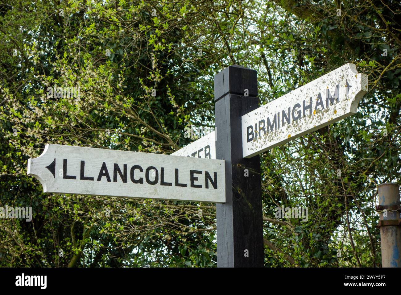 Sign post waymarker on the Shropshire union canal at Hurleston junction Cheshire towards Llangollen and Birmingham Stock Photo