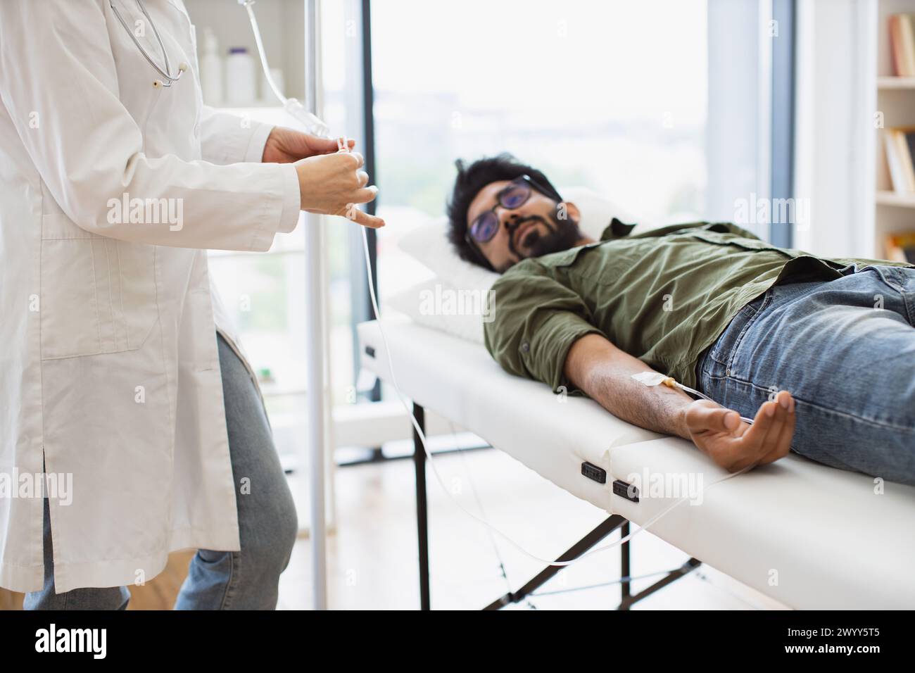 Cropped view efficient general practitioner checking solution for chemotherapy Stock Photo