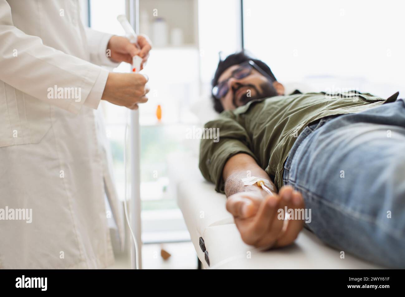 Cropped view efficient general practitioner checking solution for chemotherapy Stock Photo