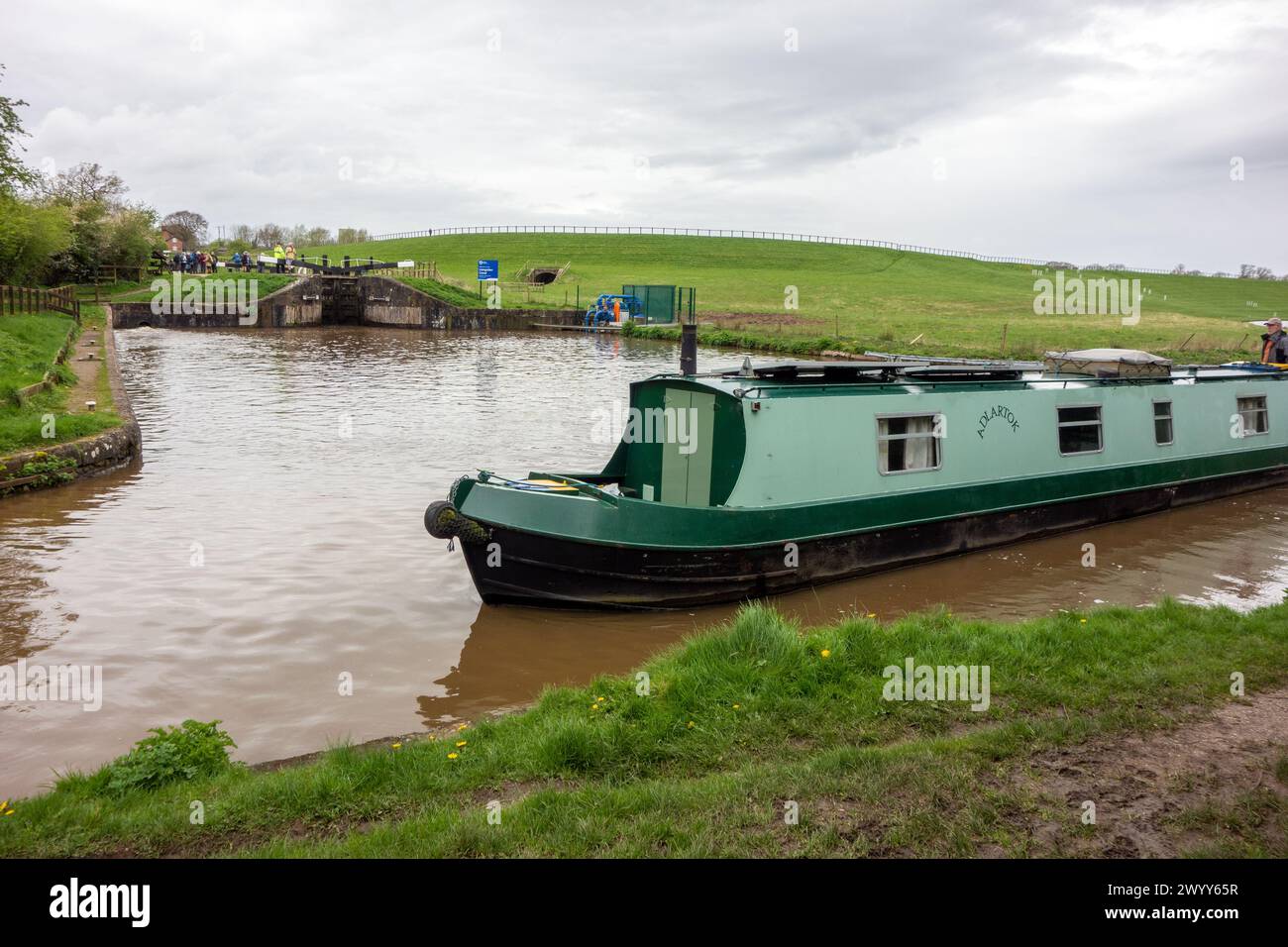 Canal narrowboat on the Shropshire Union canal heading South past the junction with the Llangollen canal at Hurleston junction near Nantwich Cheshire Stock Photo