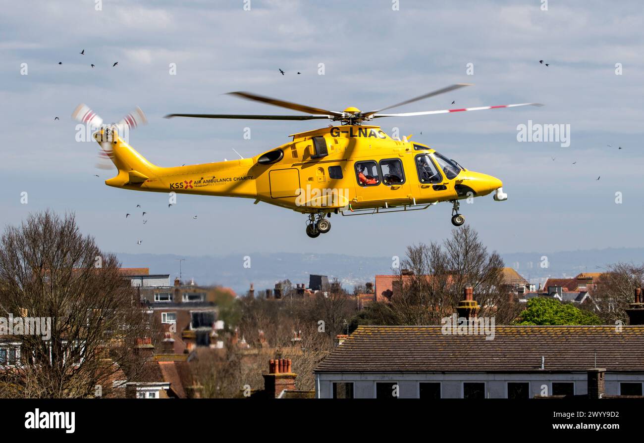 Air ambulance departs scene of traffic accident with casualty on board Stock Photo