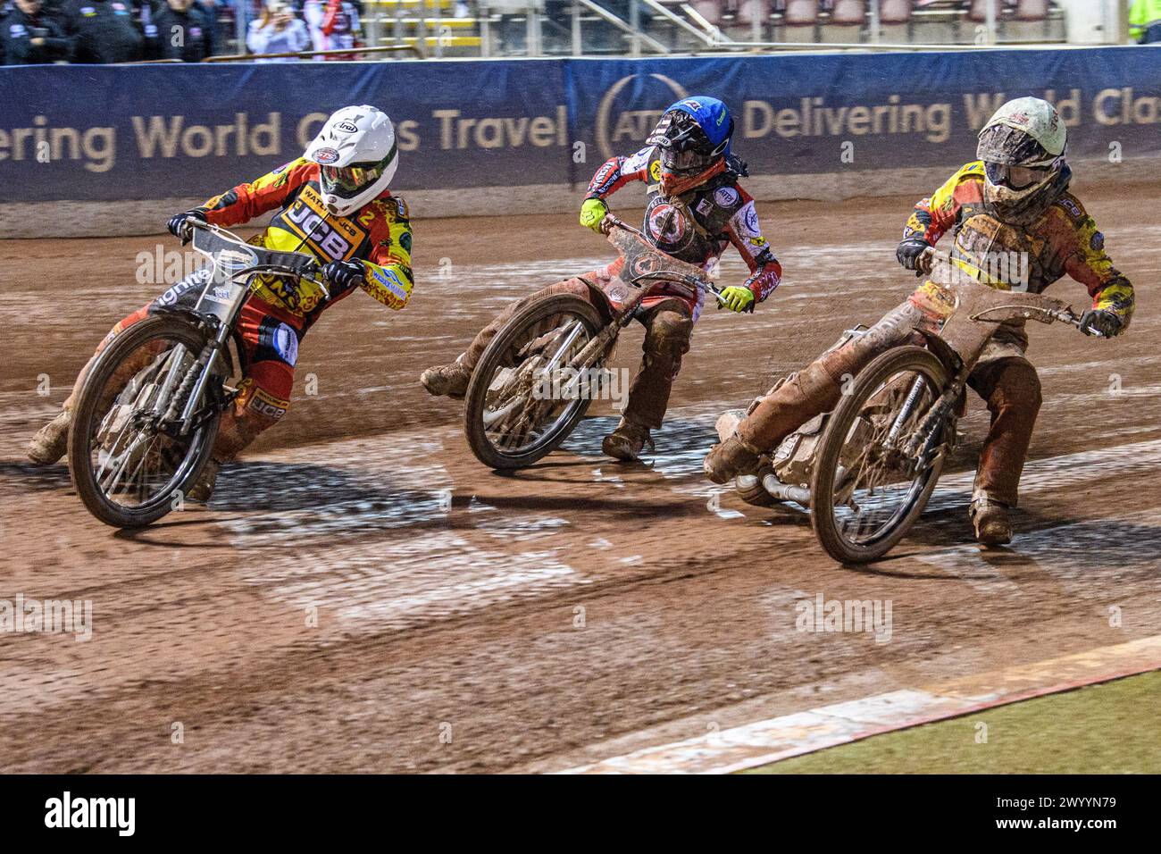 Richard Lawson of Leicester Lions in White leading Connor Bailey of Belle Vue Aces in Blue and Joe Thompson of Leicester Lions in Yellow during the Rowe Motor Oil Premiership match between Belle Vue Aces and Leicester Lions at the National Speedway Stadium, Manchester on Saturday 6th April 2024. (Photo: Ian Charles | MI News) Credit: MI News & Sport /Alamy Live News Stock Photo