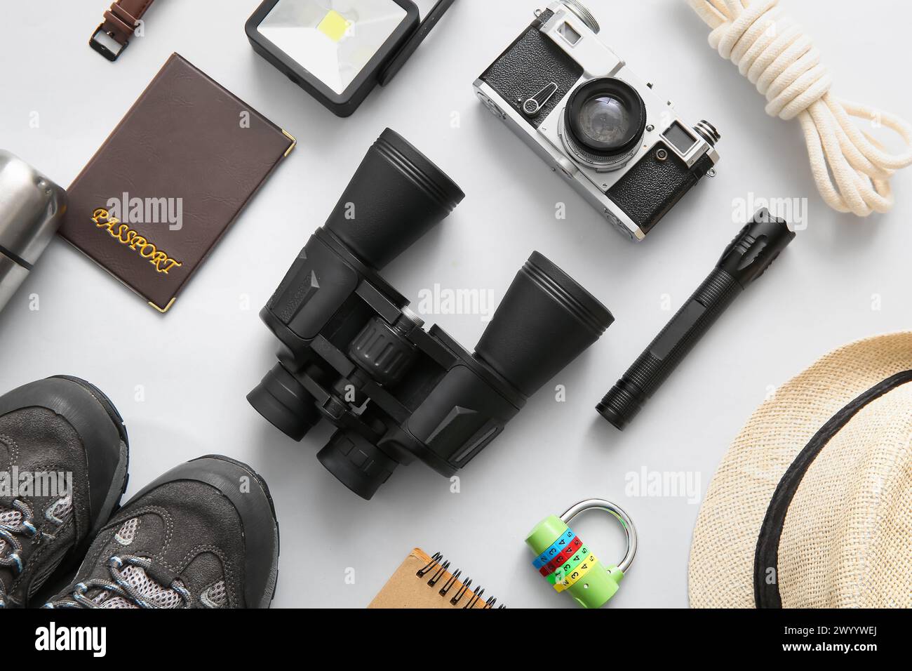Composition with travel items and passport on white background Stock Photo