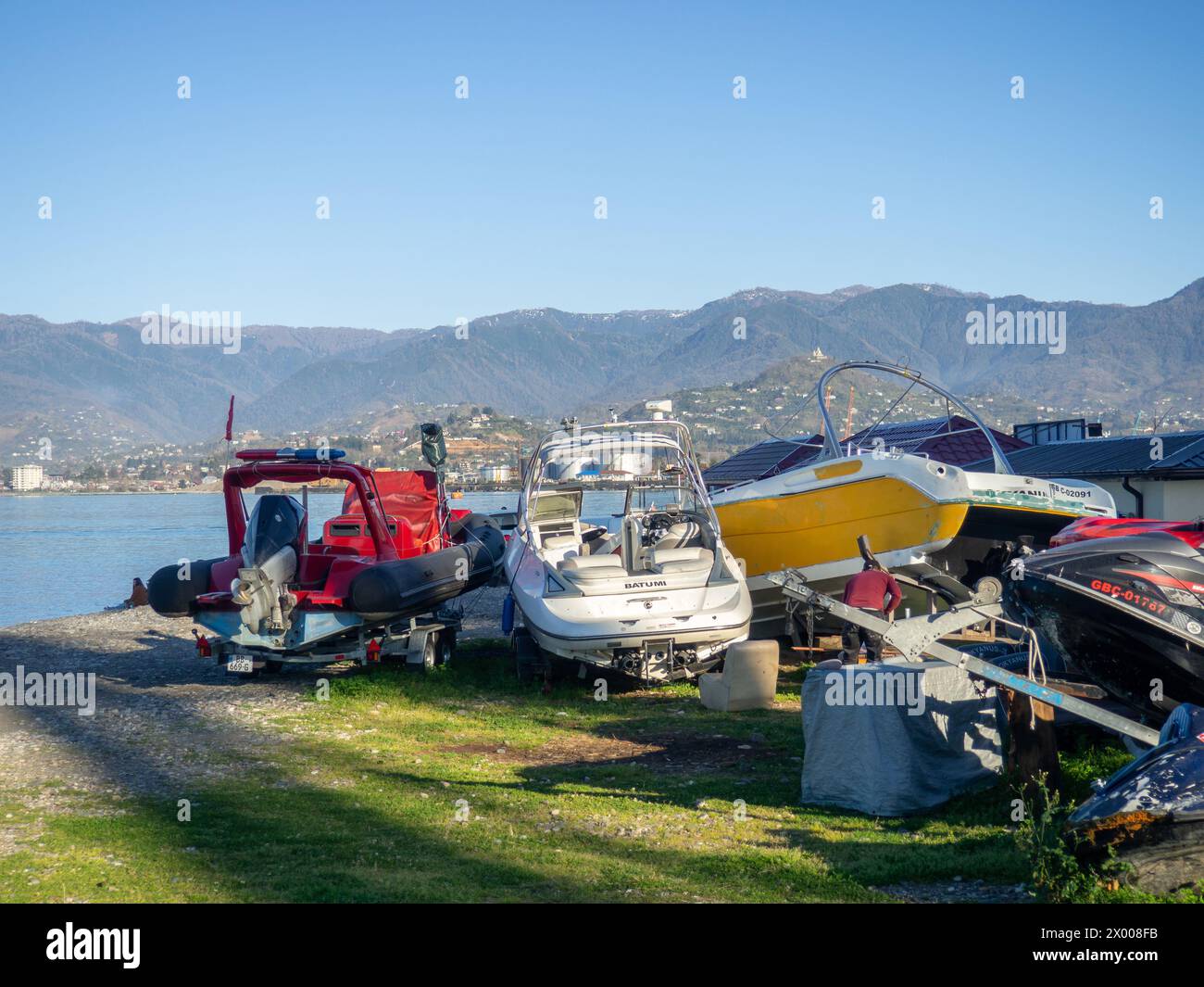 Boat dump. Inoperative vehicles. A pile of scrap metal. In winter at ...