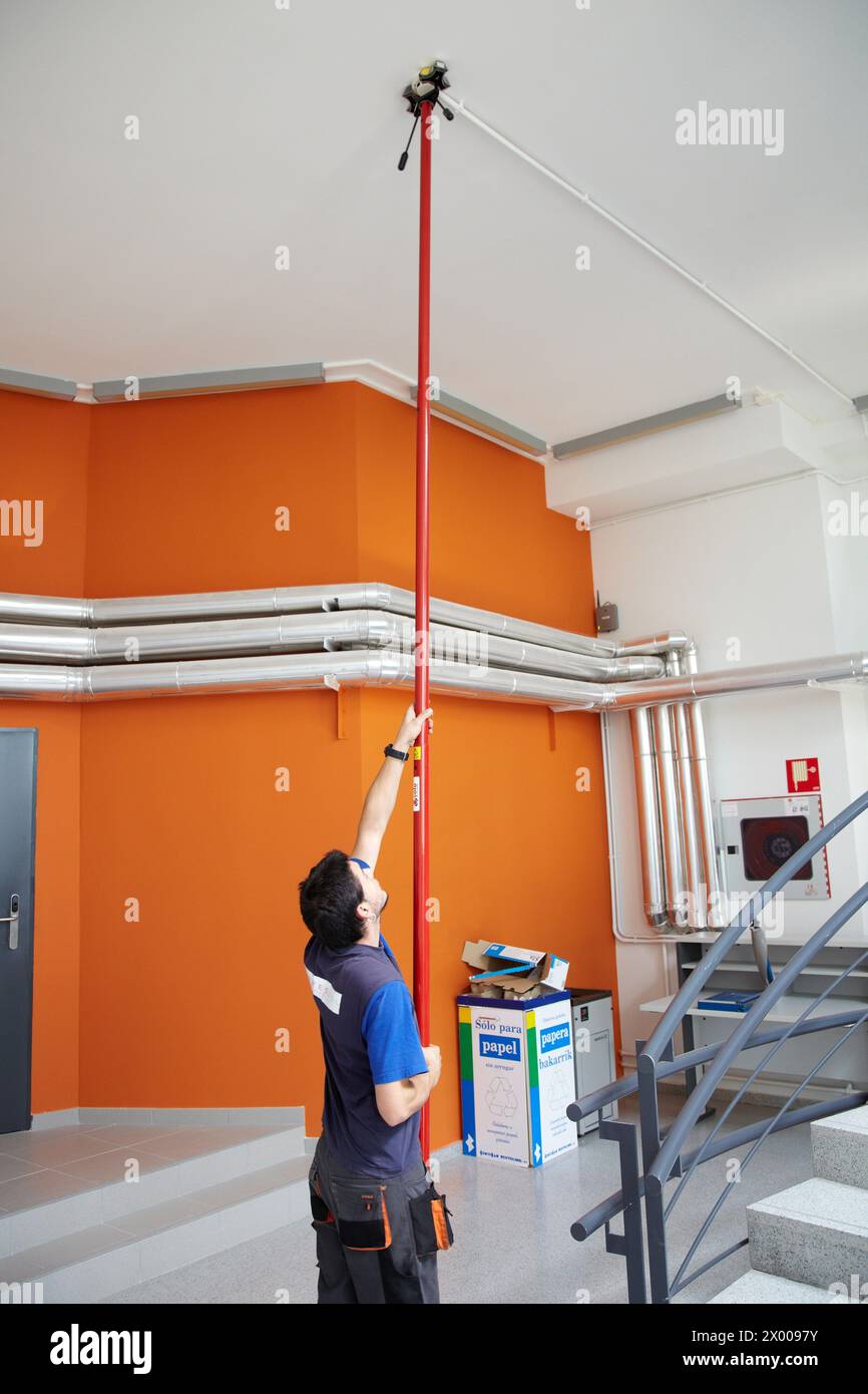 Worker adjusting the fire system, Building , Alava Technology Park ...