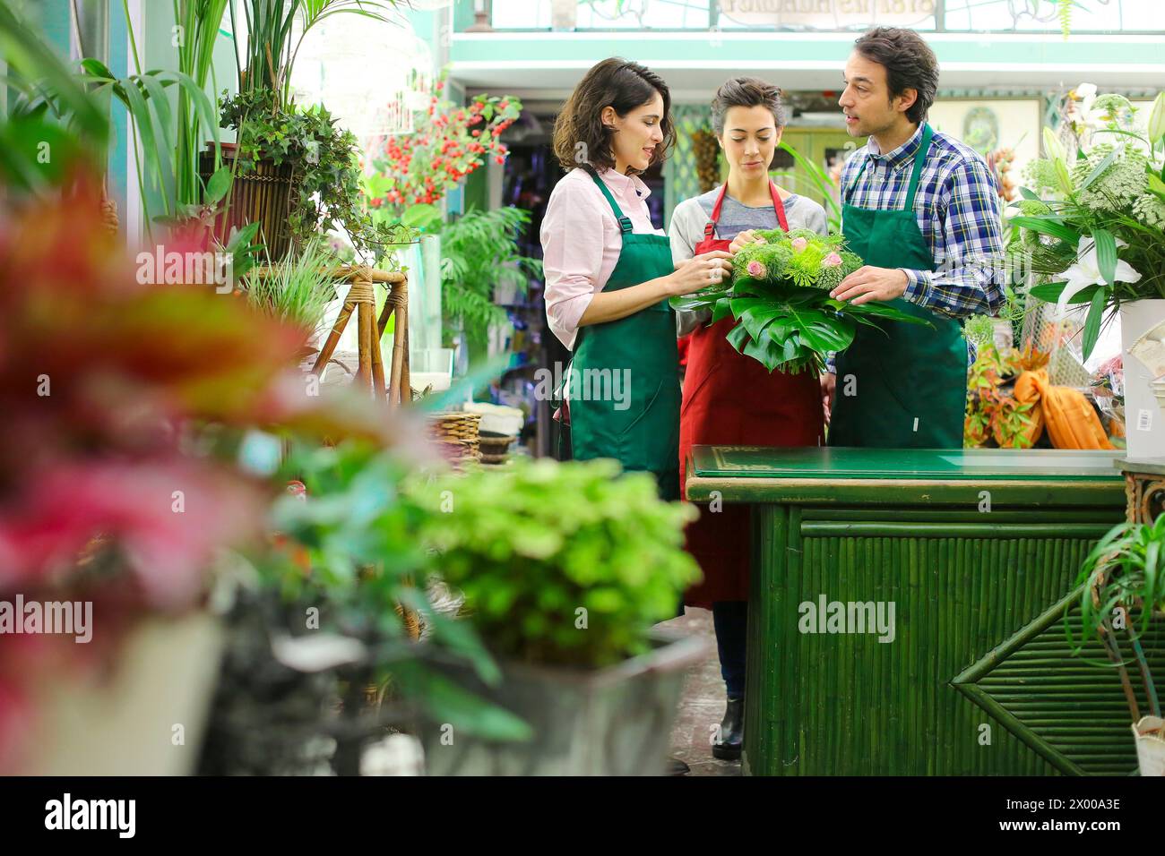 Florists in flower shop Stock Photo Alamy