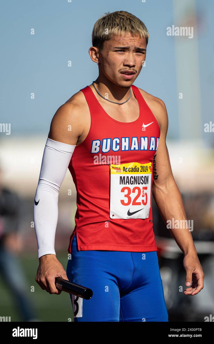 Andrew Magnuson of Buchanan prepares for the 4x100 meter relay during