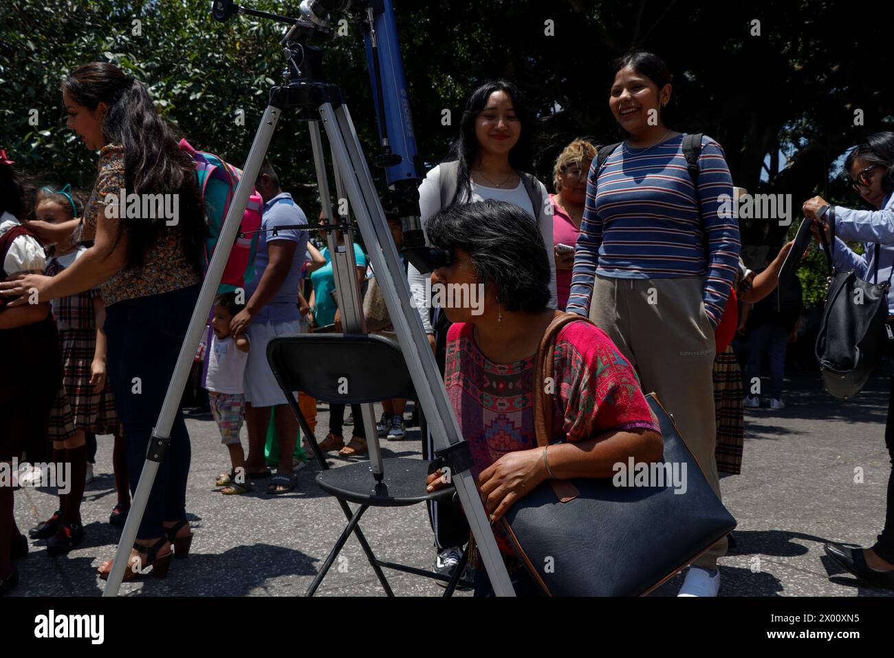 Chilpancingo, Guerrero, Mexico. 8th Apr, 2024. Hundreds of people gathered in the First Congress Plaza of Anahuac to see the astronomical phenomenon through telescopes and filters. (Credit Image: © David Juarez/ZUMA Press Wire) EDITORIAL USAGE ONLY! Not for Commercial USAGE! Stock Photo