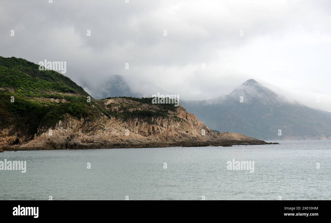 Rugged coastal landscapes in Sai Kung East Country park in Hong Kong. Stock Photo