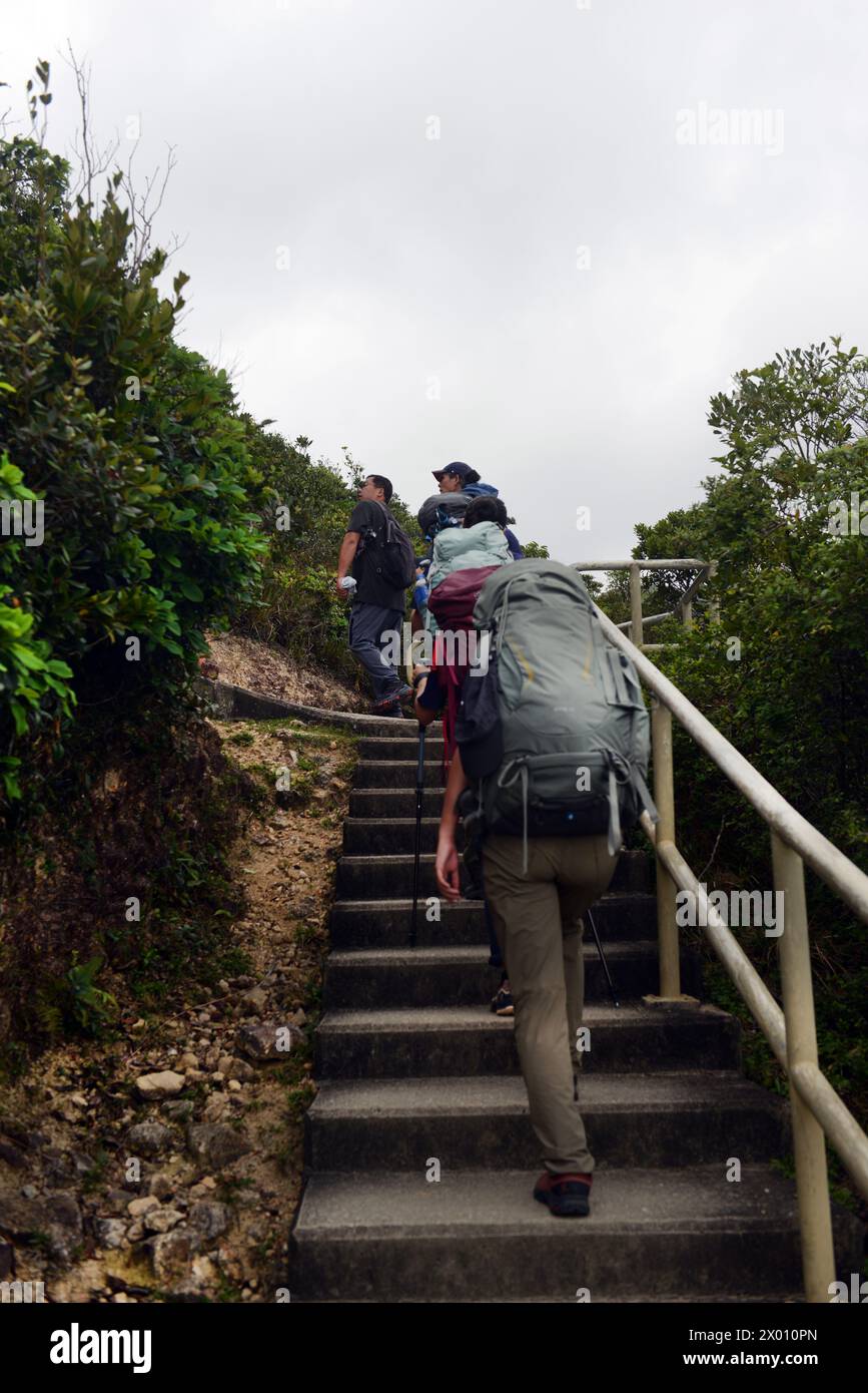 Hiking on the MacLehose Trail Section 2 at the Sai Kung East country park in Hong Kong. Stock Photo
