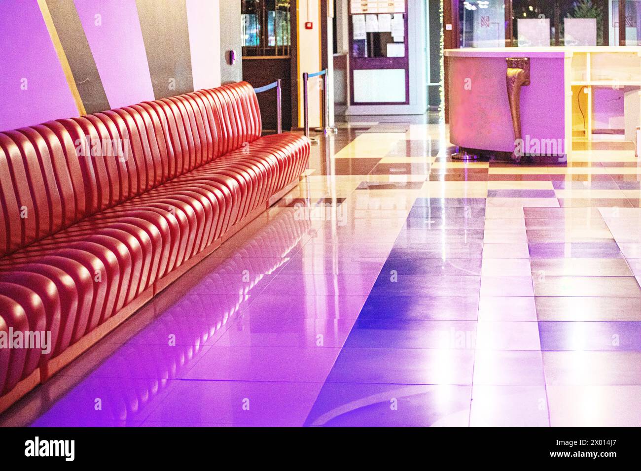 modern interior with red office sofa. Style and fashion in the interior