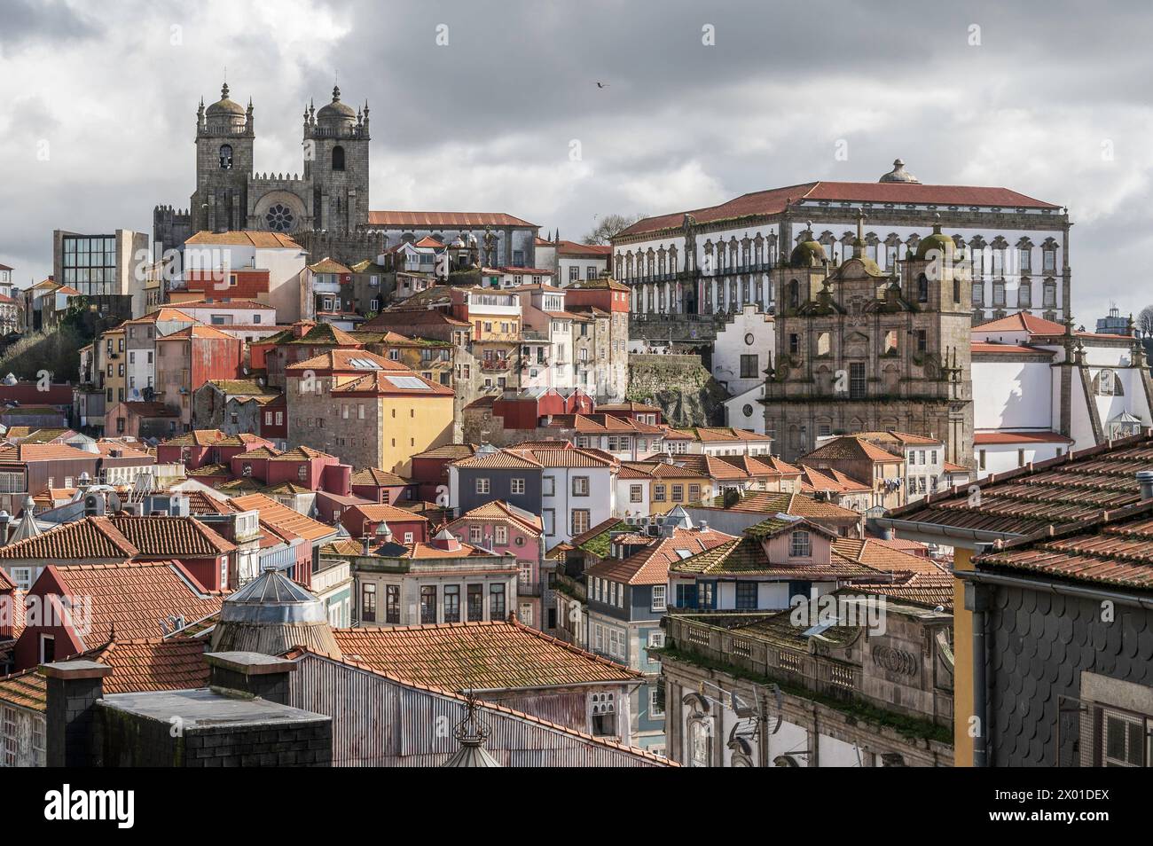 The buildings of Porto city, Portugal, with Porto Cathedral overlooking it all. The city is famous for the export of Port, a fortified wine Stock Photo