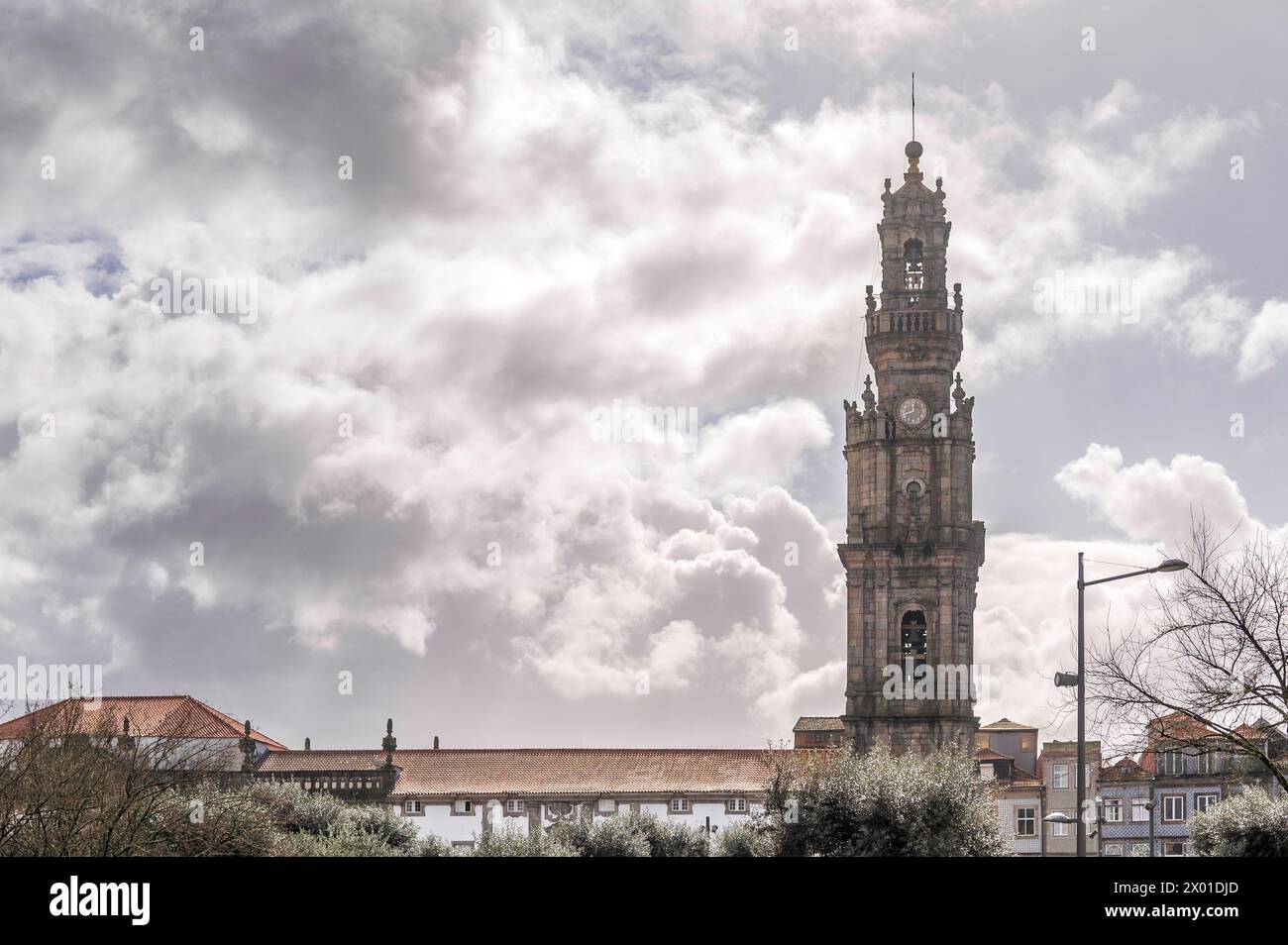 Bell tower of the Clerigos Church (Church of the Clergymen), a baroque church in backlit winter sunshine. City of Porto, in Portugal. Stock Photo