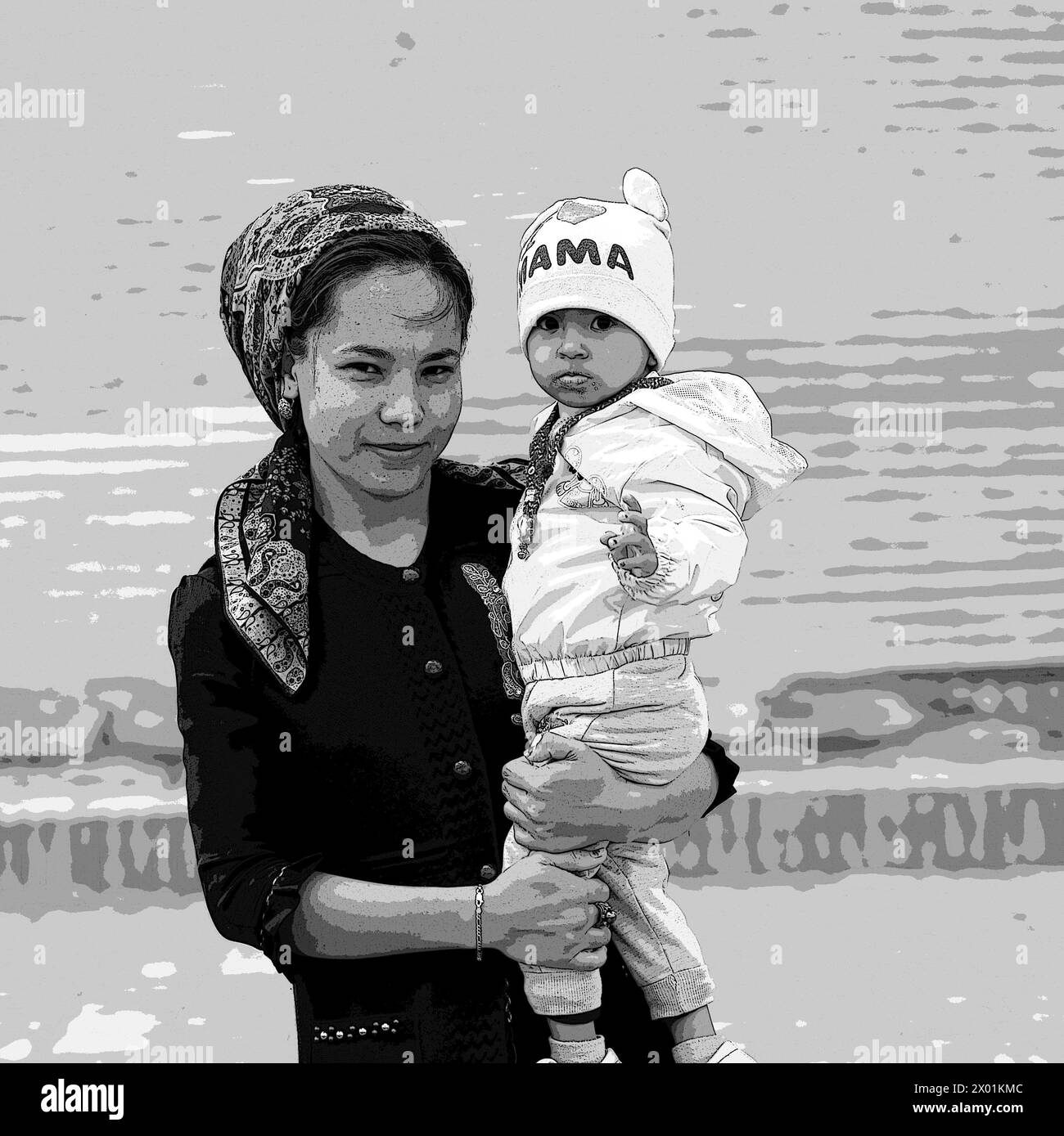Young mother with child at archaeological site in Kunya Urgench, Turkmenistan Stock Photo