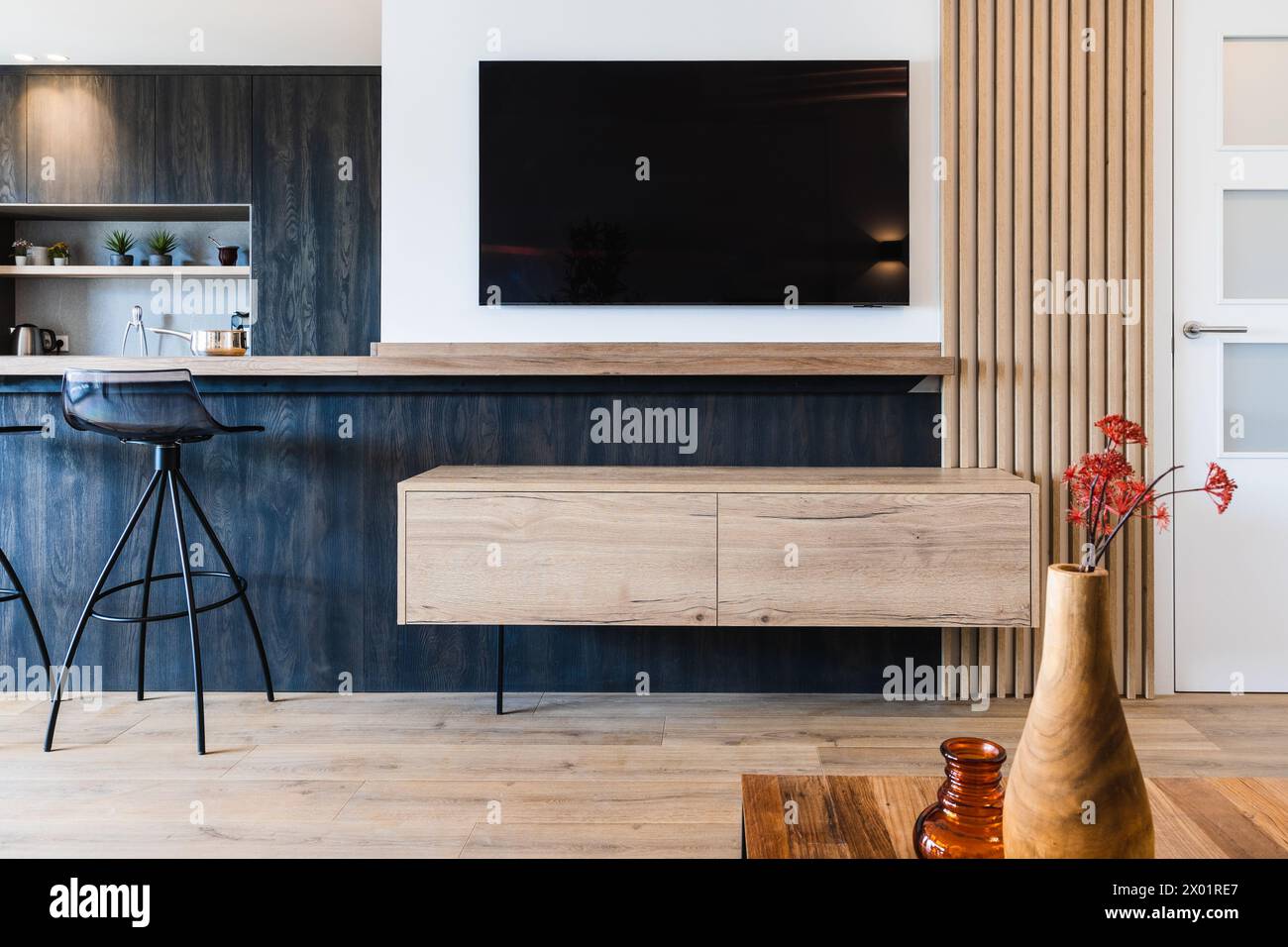 Picture of Modern living room with elegant wood accents Stock Photo - Alamy